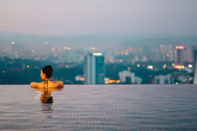 A woman in an infinity pool